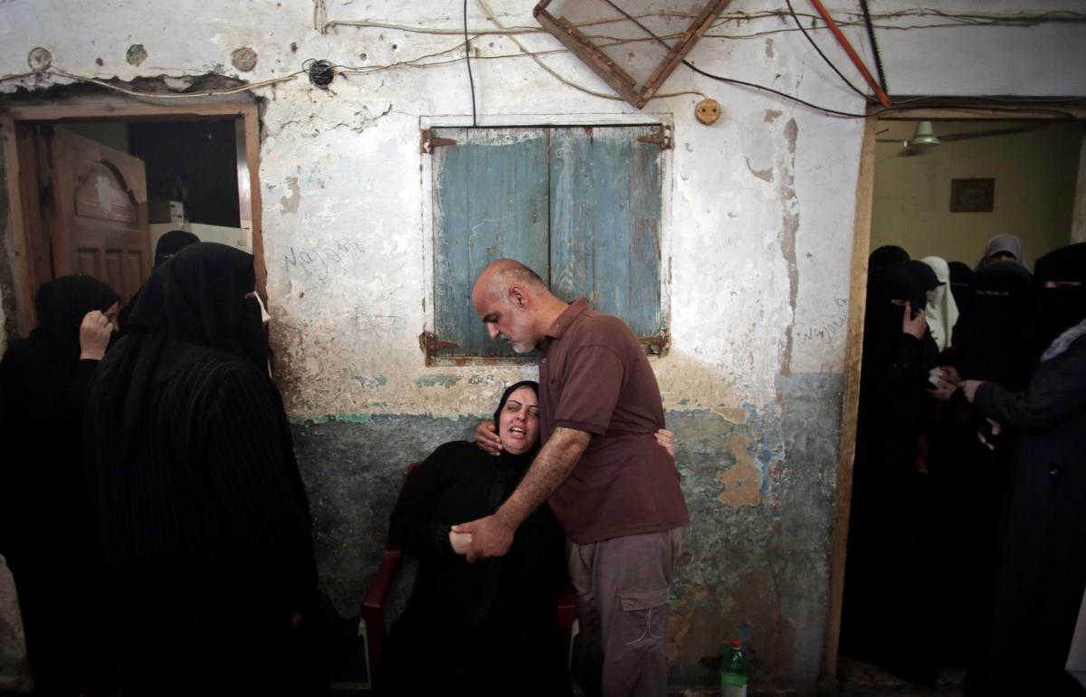 Palestinian relatives of eight members of the Al Haj family