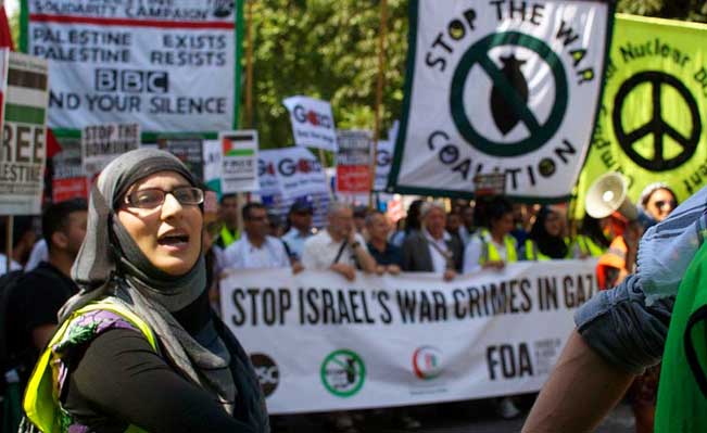 Gaza protestor in London. Women played a big part in organising against injustice. Photo: Jim Aindow