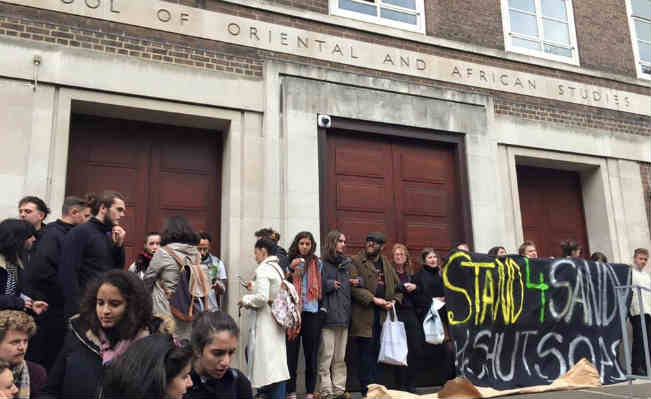 Students bar entry into the main building at SOAS. Photo: James Eastwood