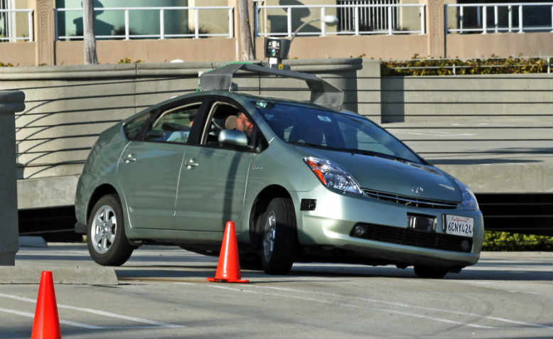 A Toyota Prius modified to operate as a Google driverless car navigating a test course, March 2011. Photo: Wikimedia/Steve Jurvetson