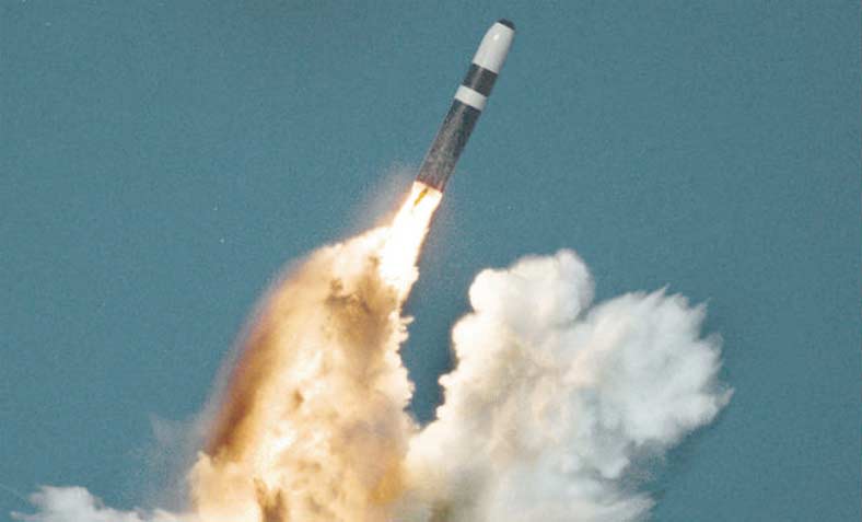 A Trident II missile fires its first stage after an underwater launch from a ballistic missile submarine. Photo: Wikipedia