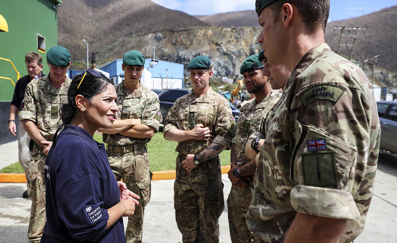 Priti Patel MP talking to Royal Engineers at Henry Wilfred Smith Power Station. Photo: Flickr / DFID