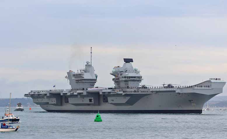 HMS Queen Elizabeth (R08) entering Portsmouth Naval Base on her delivery voyage 16 August 2017. Photo: Brian Burnell