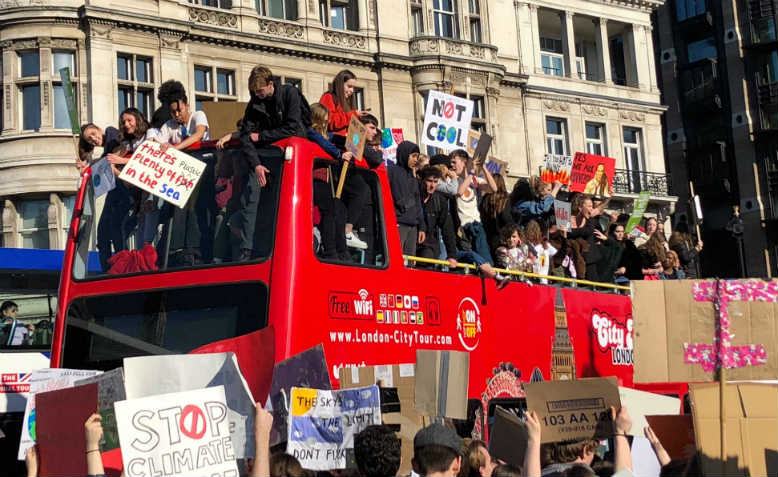 Students occupy a tour bus in Parliament Square, Friday 15 February 2019. Photo: Shabbir Lakha