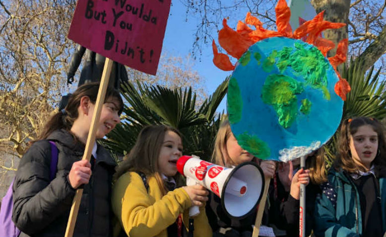 Young girls with placards 