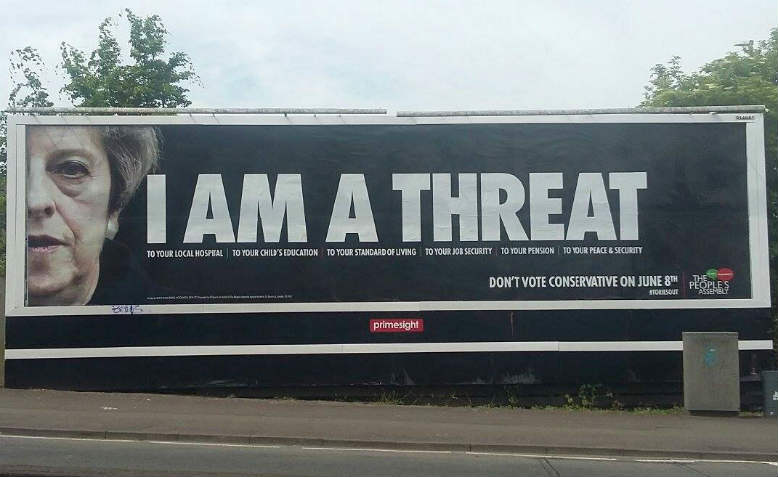 Theresa May is a threat billboard, June 2017. Photo: The People's Assembly Against Austerity