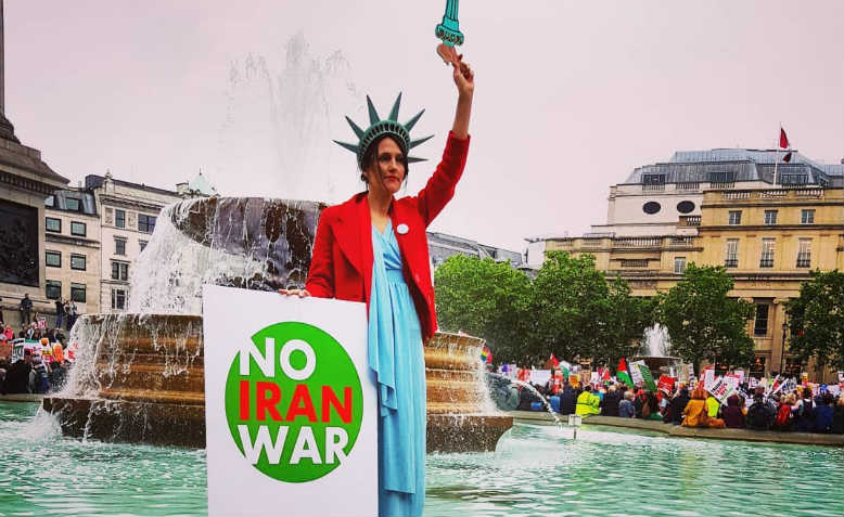 'No Iran War' at the demonstration against Trump, London, 4 June. Photo: Chrissy Brand