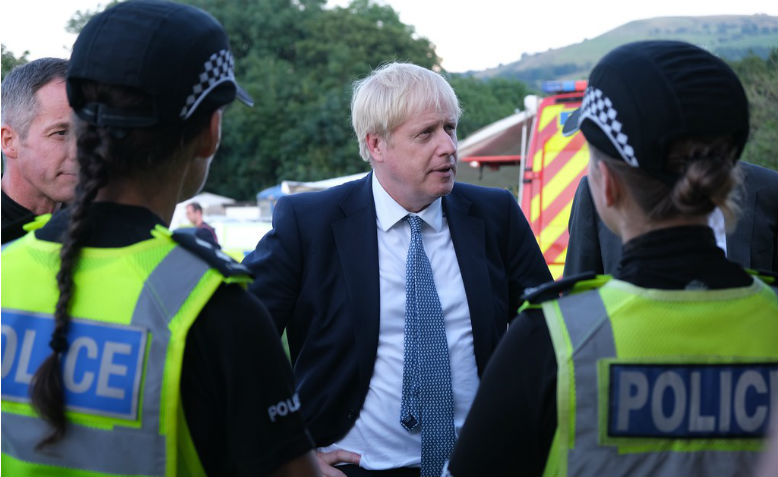 Boris Johnson with police