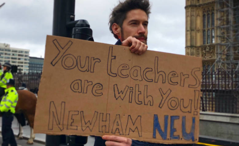 Newham NEU teacher supporting the climate strike. Photo: Shabbir Lakha