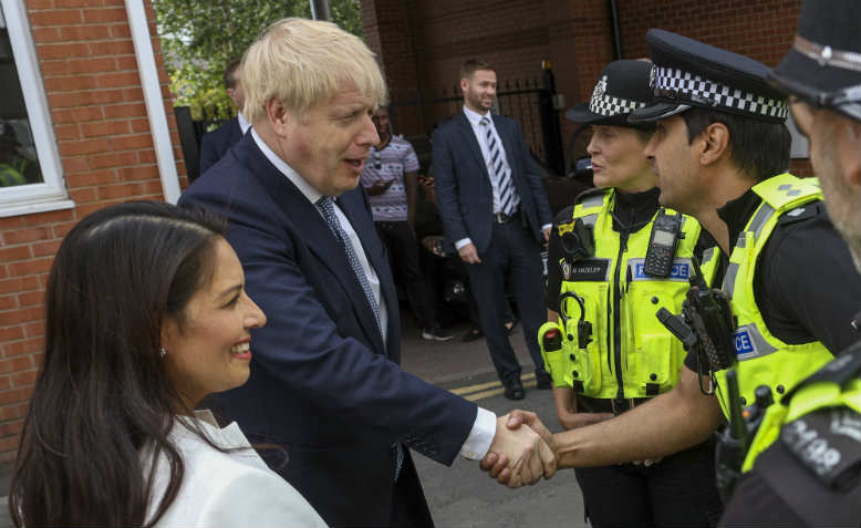 Boris Johnson, Priti Patel and the police. Photo: Flickr/Number 10