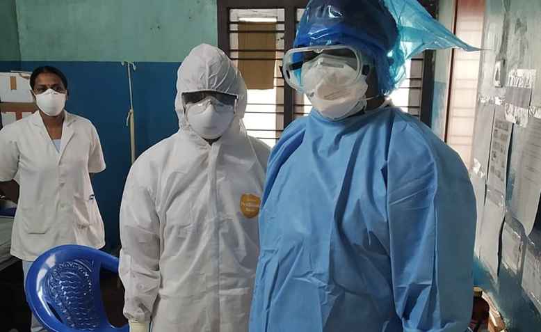 Health worker in PPE, India, March 2020. Photo: wikimedia commons