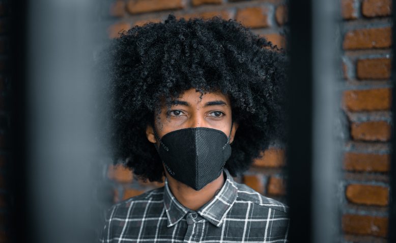 Person wearing face mask. Photo: Pexels