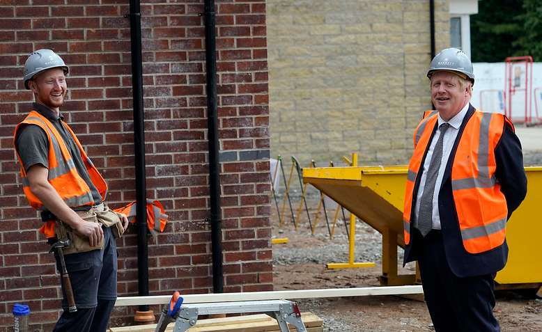 Boris Johnson meeting consutruction worker. Photo: Andrew Parsons / No 10 Downing Street/ Flickr / cropped from original / licensed under CC 2.0, links at the bottom of article