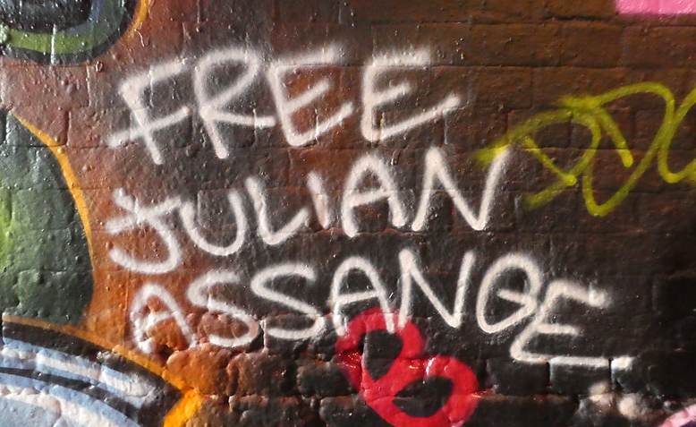 Free Julian Assange graffiti in London. Photo: Flickr - Duncan Cumming / cropped from original / licensed under CC 2.0, links at the bottom of article