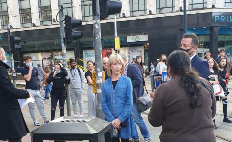 Laila Hassan confronts Debenhams store manager at Saturday's protest. Photo: Chris Neville