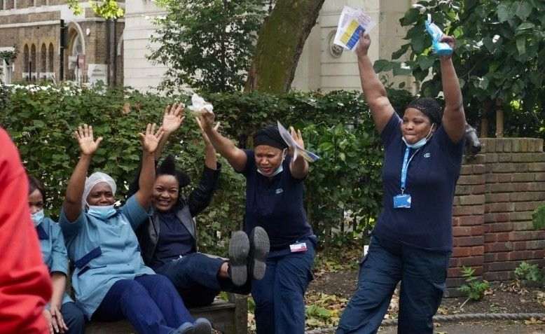 Strikers at GOSH celebrating the good news.