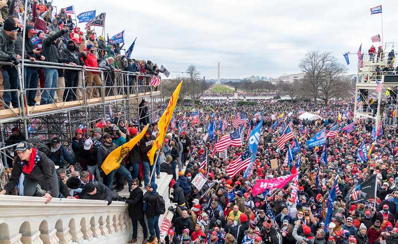 Trump supporters on Capitol Hill, Jan 6th. Photo: Blink O'fanaye / Flickr / cropped from original / CC BY-NC 2.0, license linked at bottom of article 