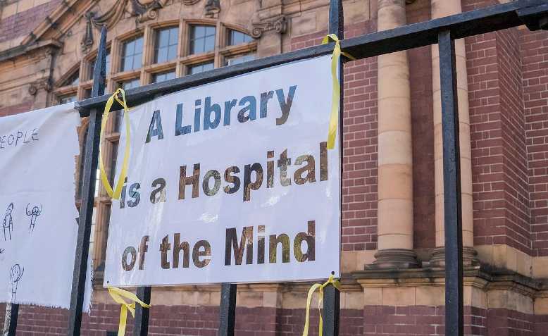 A protest against council cuts to library services at the re-opening of Carnegie Library in Herne Hill.