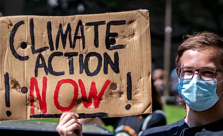 A climate change activist in Melbourne, March 2021. Photo: Flickr/Matt Hrkac 