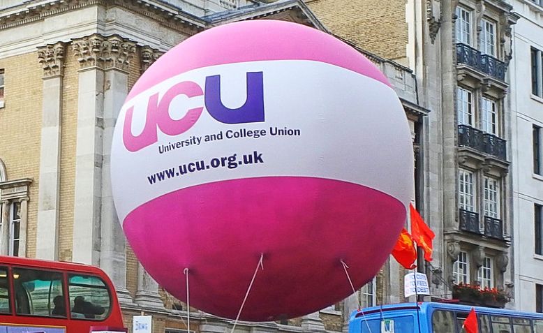 UCU Balloon, July 18, 2019, Westminster Photo: It’s No Game / cropped from original / licensed under Creative Commons Attribution 2.0 Generic (CC BY 2.0), linked at the bottom of article