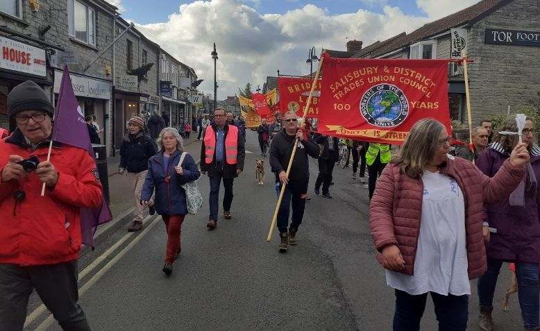 Striking Clarks staff marching through the streets.