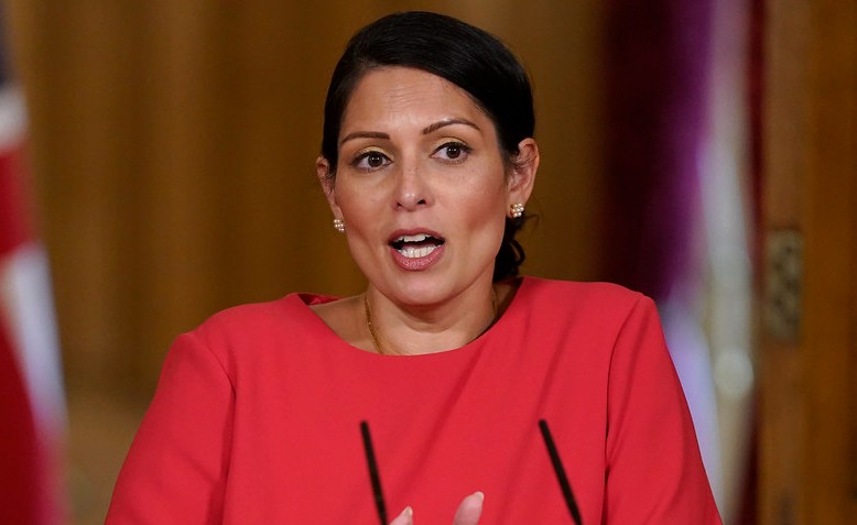 Priti Patel Covid-19 Press Conference 22/05| Photo: UK Prime Minister – Flickr | cropped from original | CC BY-NC-SA 2.0 | license linked at bottom of article