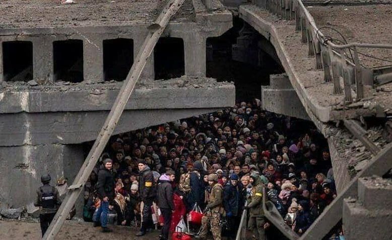 Ukrainian civilians sheltering under a bridge in Kyiv