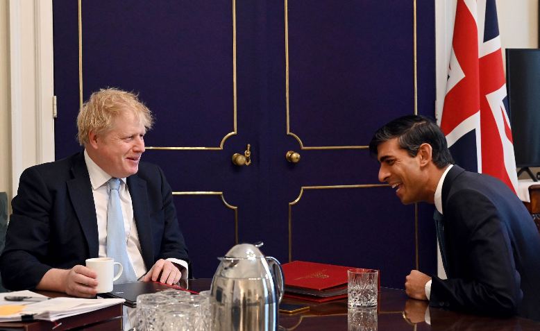 Boris Johnson and Rishi Sunak laughing