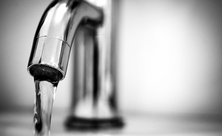 Water pouring from a tap