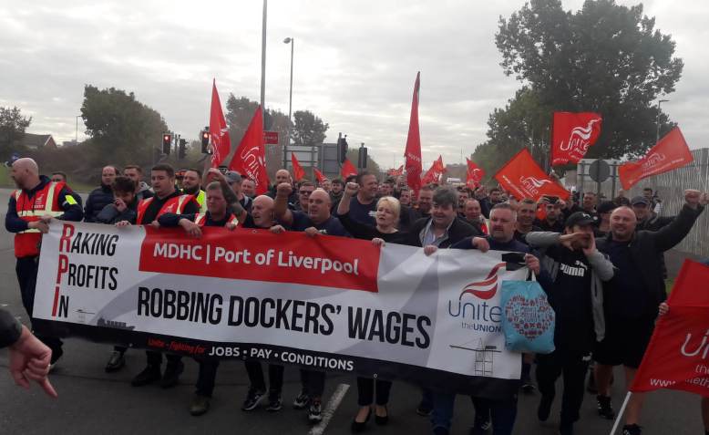 Striking Liverpool dockers march