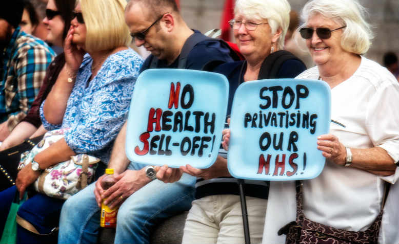 Activists protesting against health cuts in 2014, Trafalgar Square. Photo: Flickr/Garry Knight 