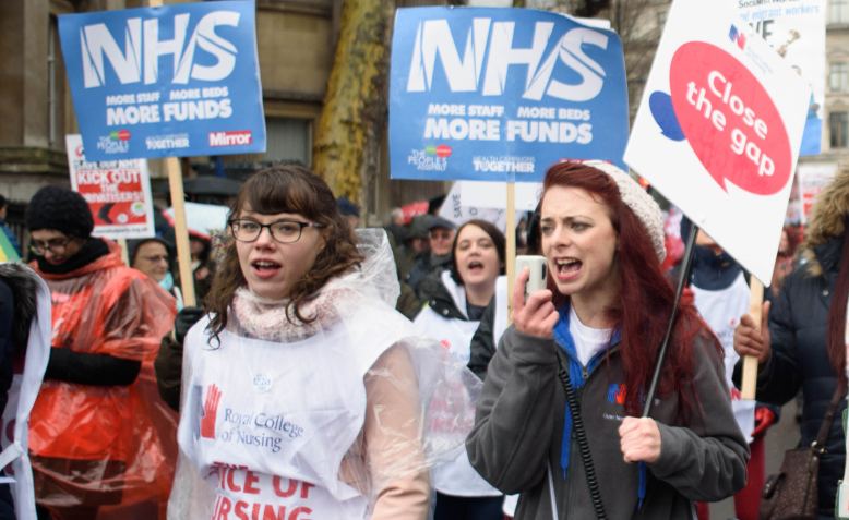 RCN members marching on the People's Assembly demonstration for the NHS, 2018