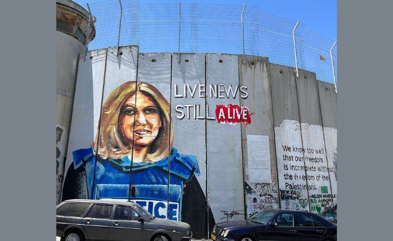 Shireen Abu Akleh graffiti on the West Bank barrier in Bethlehem