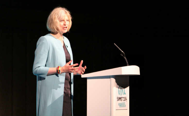 Theresa May speaking at the Girl Summit in 2014. Photo: Flickr/Russell Watkins