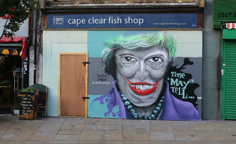 Theresa May in graffiti art, South London. Photo: Wikimedia/ Jwslubbock