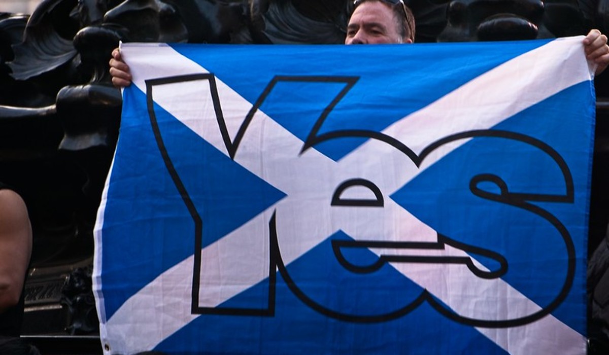 Independence supporter holds 'Yes' Scottish flag