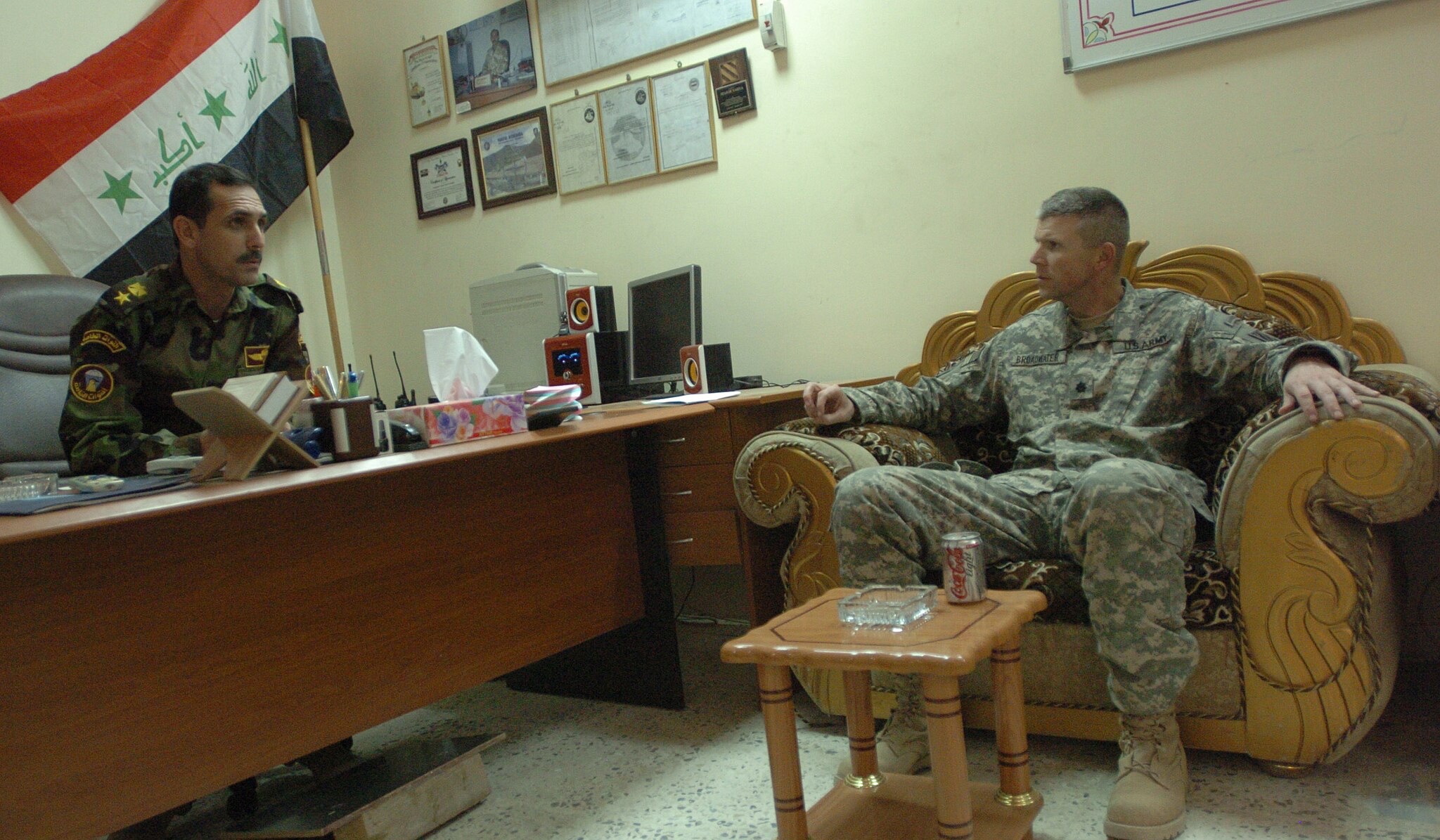 US soldier with an Iraqi official, 2007