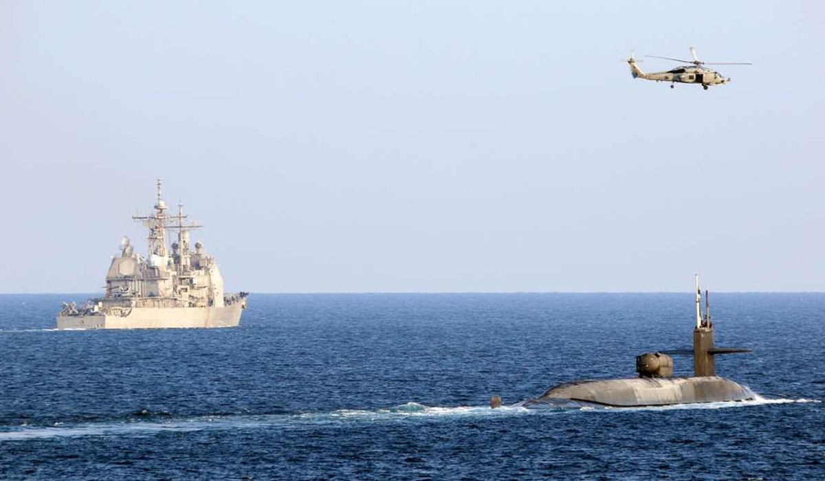 USS Georgia and USS Port Royal transiting the Strait of Hormuz.