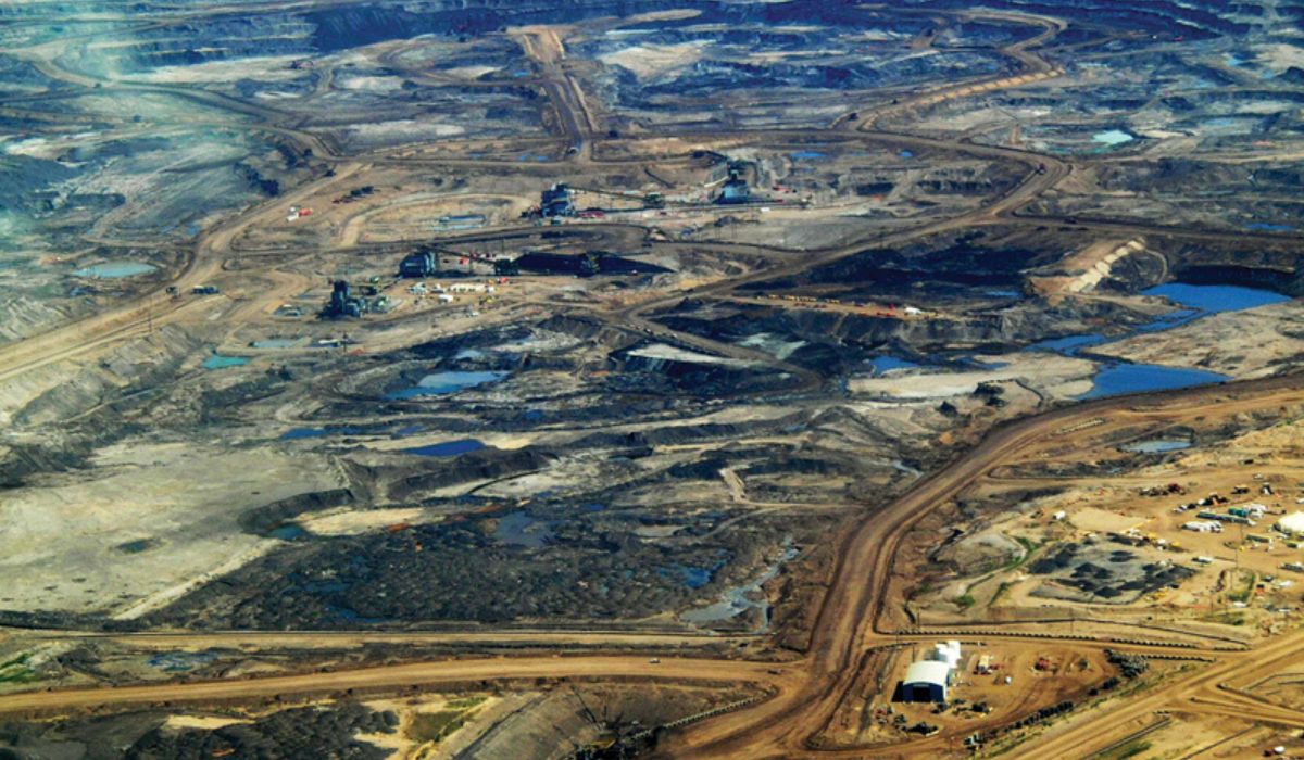 Aerial photograph of open pit mine in the tar sands oil fields of Alberta, Canada.